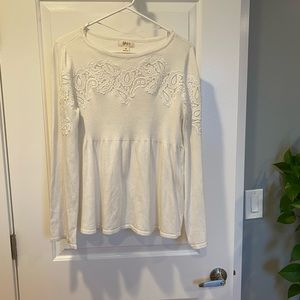 Bell sleeve sweater with paisley cutouts